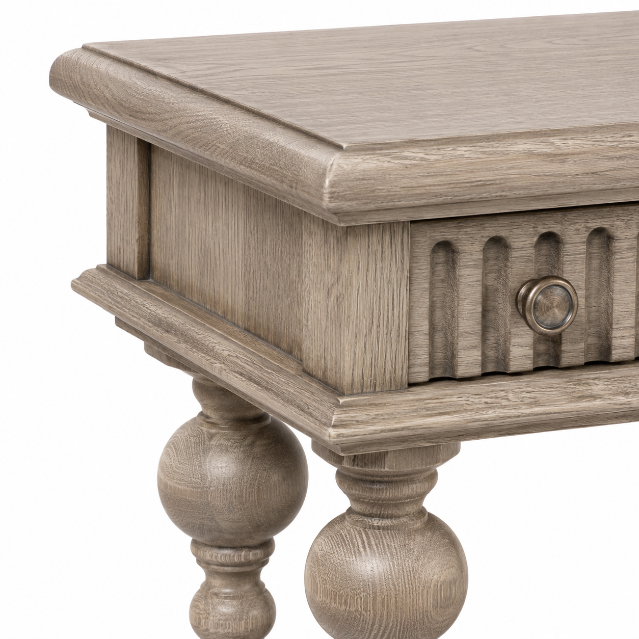 Close-up of the solid oak finish and fluted drawer detailing of the Gaillac console table