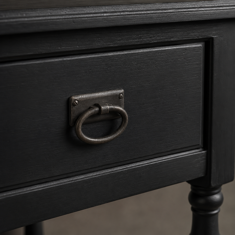 Close-up of the black finish and detailing of the Tournus console table