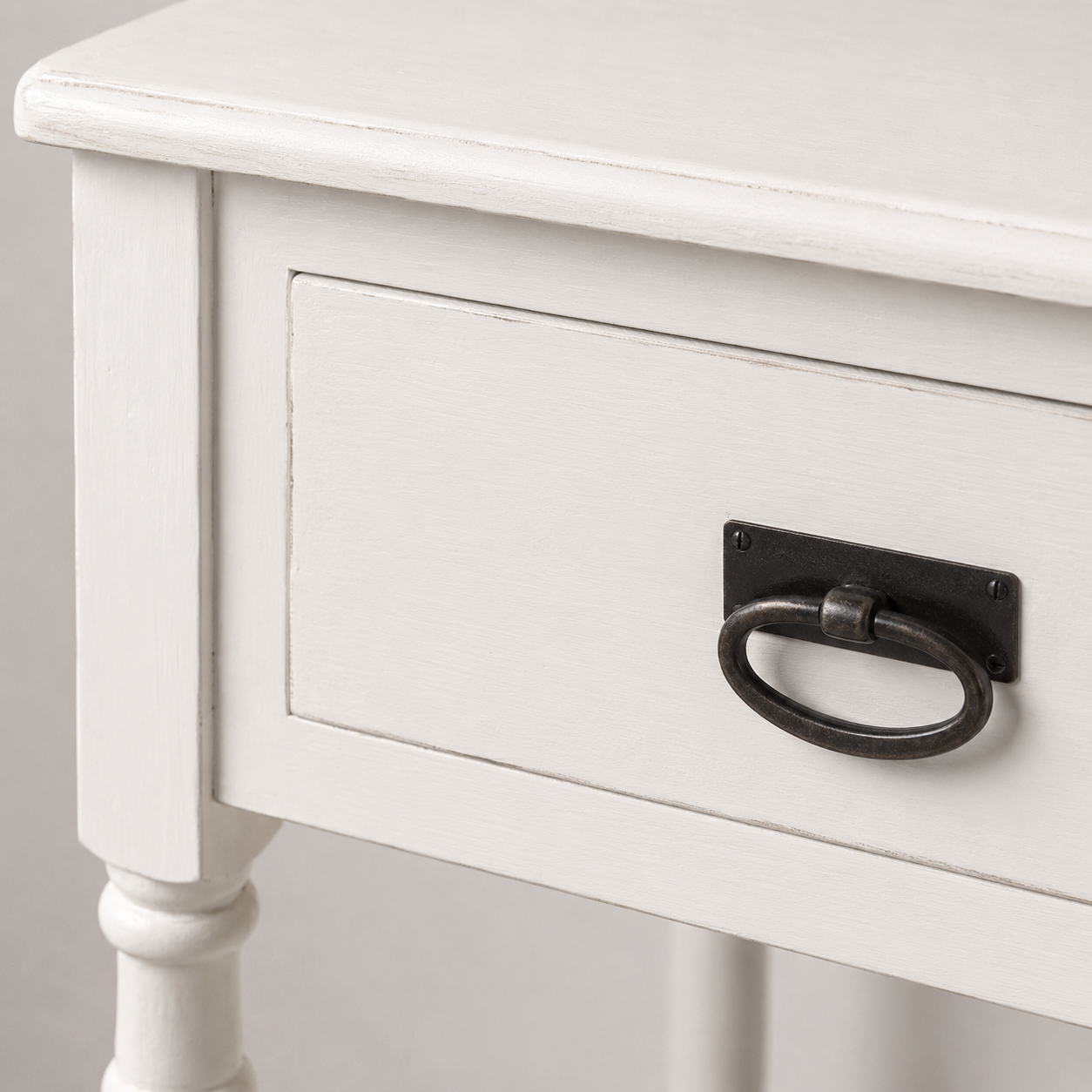Close-up of the white finish and detailing of the Tournus console table