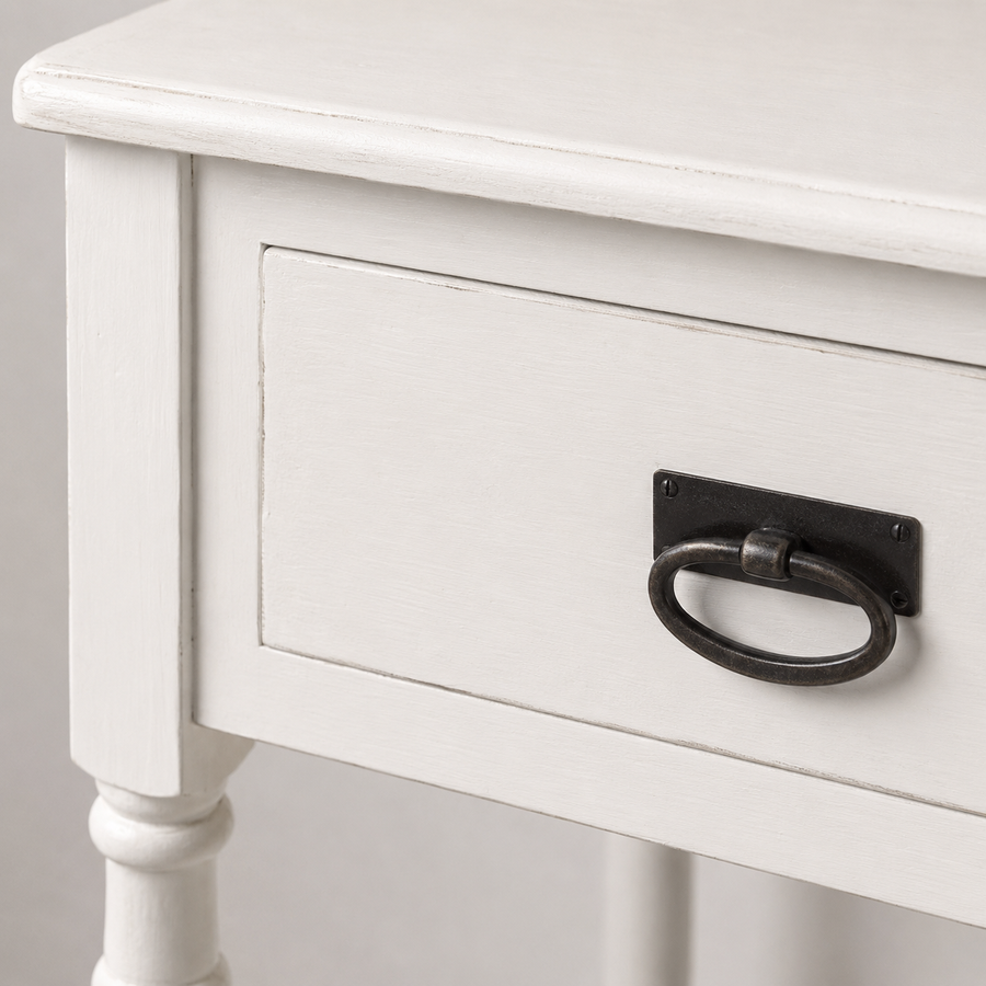 Close-up of the white finish and detailing of the Tournus console table