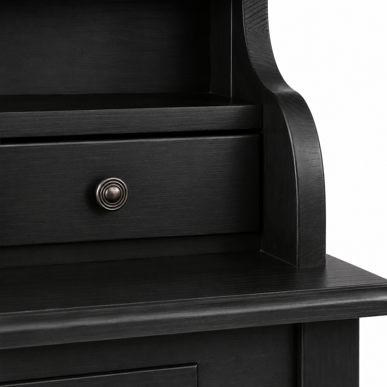 Close-up of the antique knob and drawer on the classic black solid pine Cheverny desk
