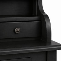 Close-up of the antique knob and drawer on the classic black solid pine Cheverny desk