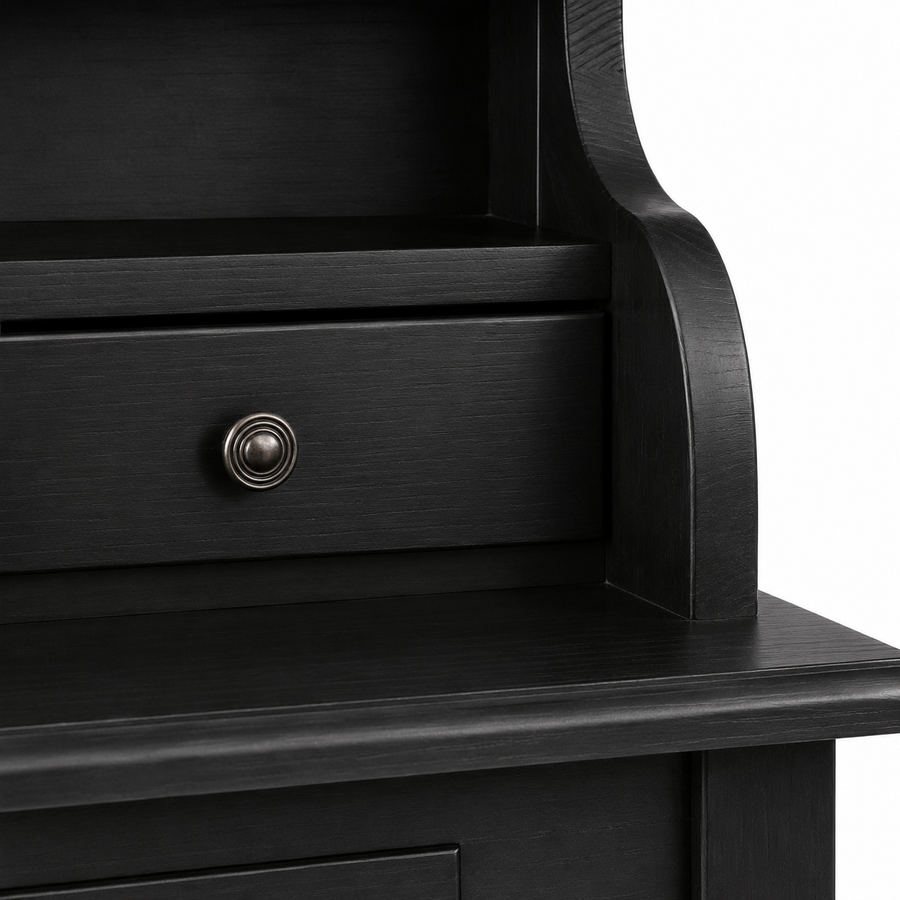 Close-up of the antique knob and drawer on the classic black solid pine Cheverny desk