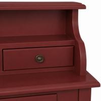 Close-up of the brass ring pull on the classic bordeaux pine Cheverny writing desk