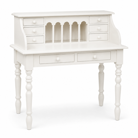 Classic white solid pine Dinan desk, three-quarter view showing turned legs and six small drawers