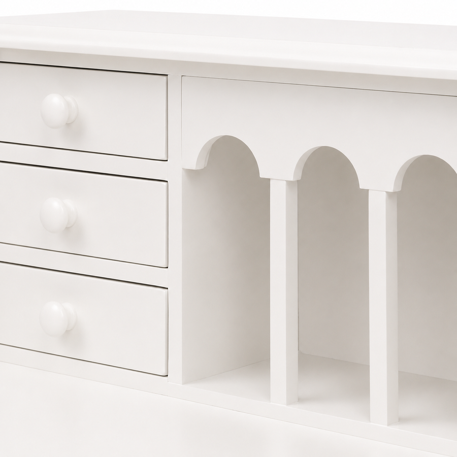 Close-up of the small drawers and arched pigeonholes on the classic white Dinan desk