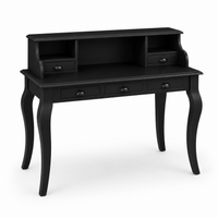 Classic black Vendome desk, three-quarter view showing five drawers and curved cabriole legs