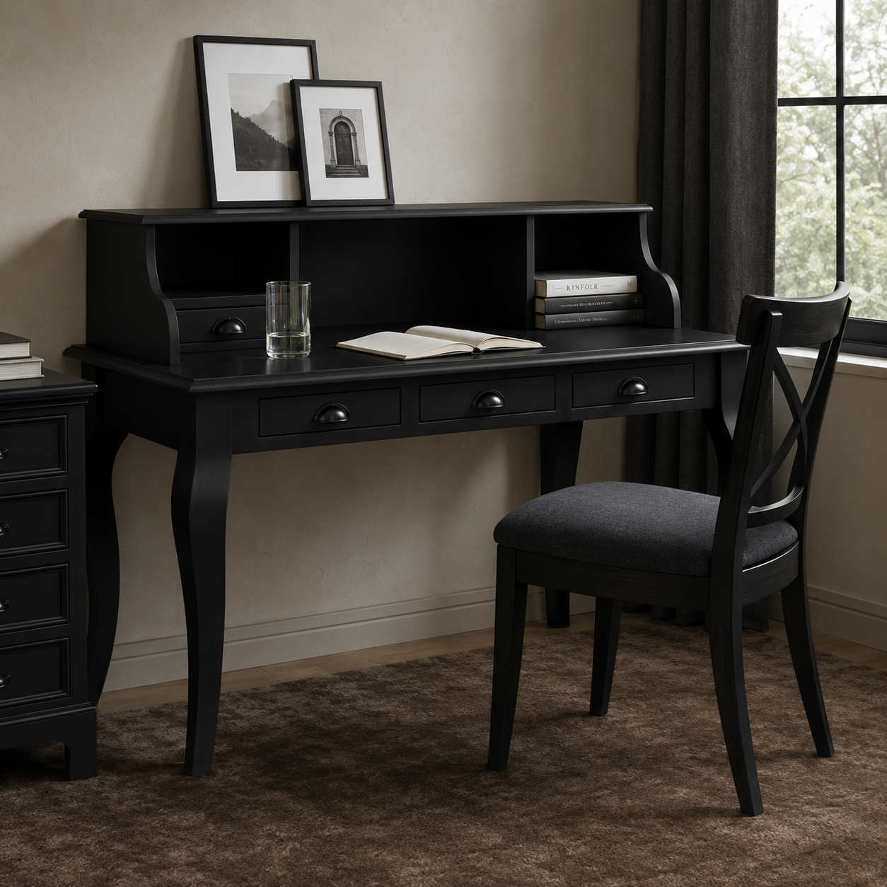 Classic black Vendome desk styled in a home office with chair and books, 130 cm wide