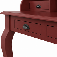 Close-up of the black cup handle on the classic bordeaux pine Vendome desk