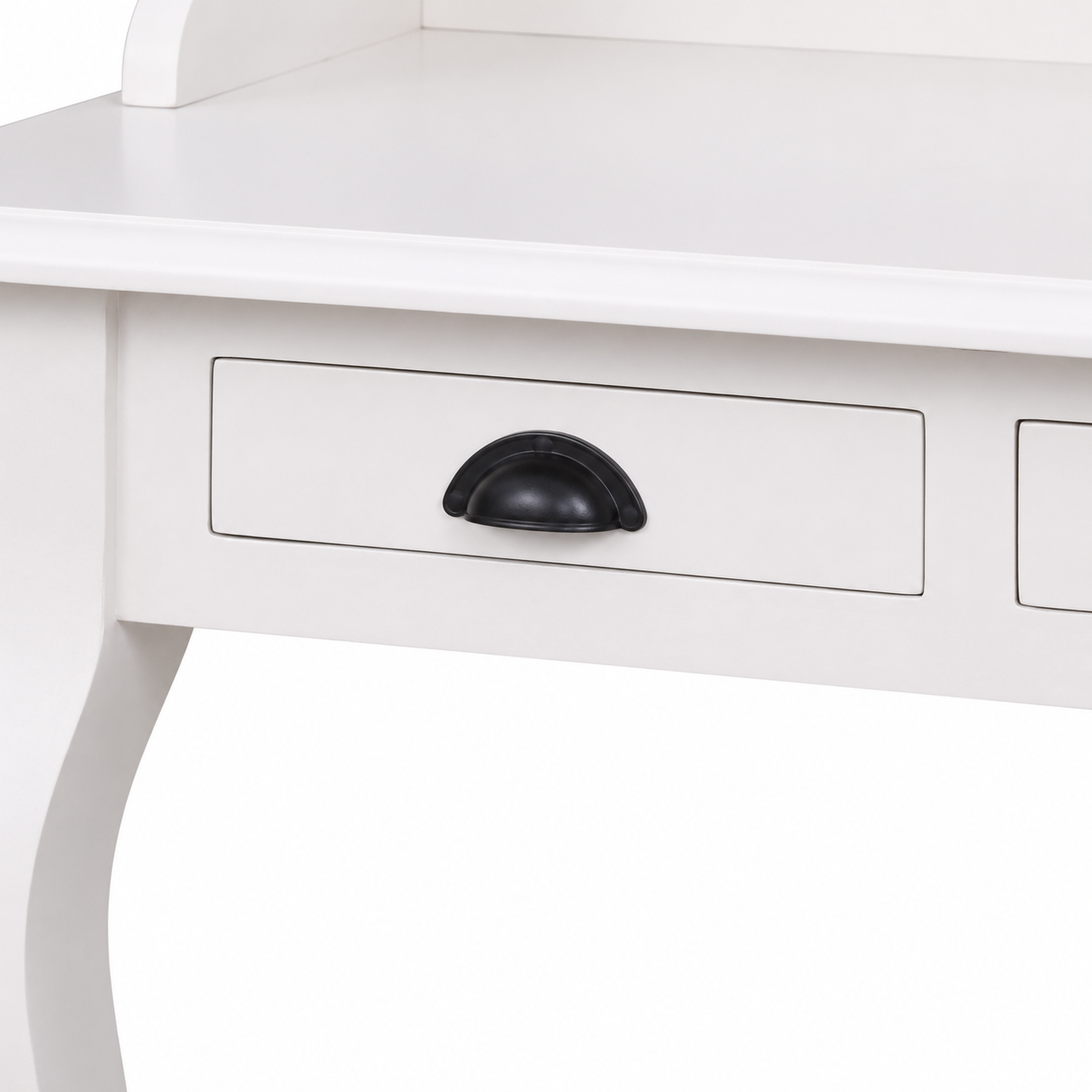 Close-up of the black cup handle on the classic white solid pine Vendome desk