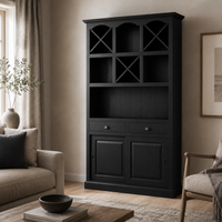 Epernay bar cabinet in black styled in a living room