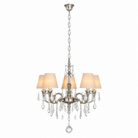 Hanglamp Gus 1088O by Marcottestyle, Antiek Zilver chandelier with six E14 bulbs softly illuminated through fabric lampshades, warm glow visible through shade material, front view on pure Wit background, professional product photography