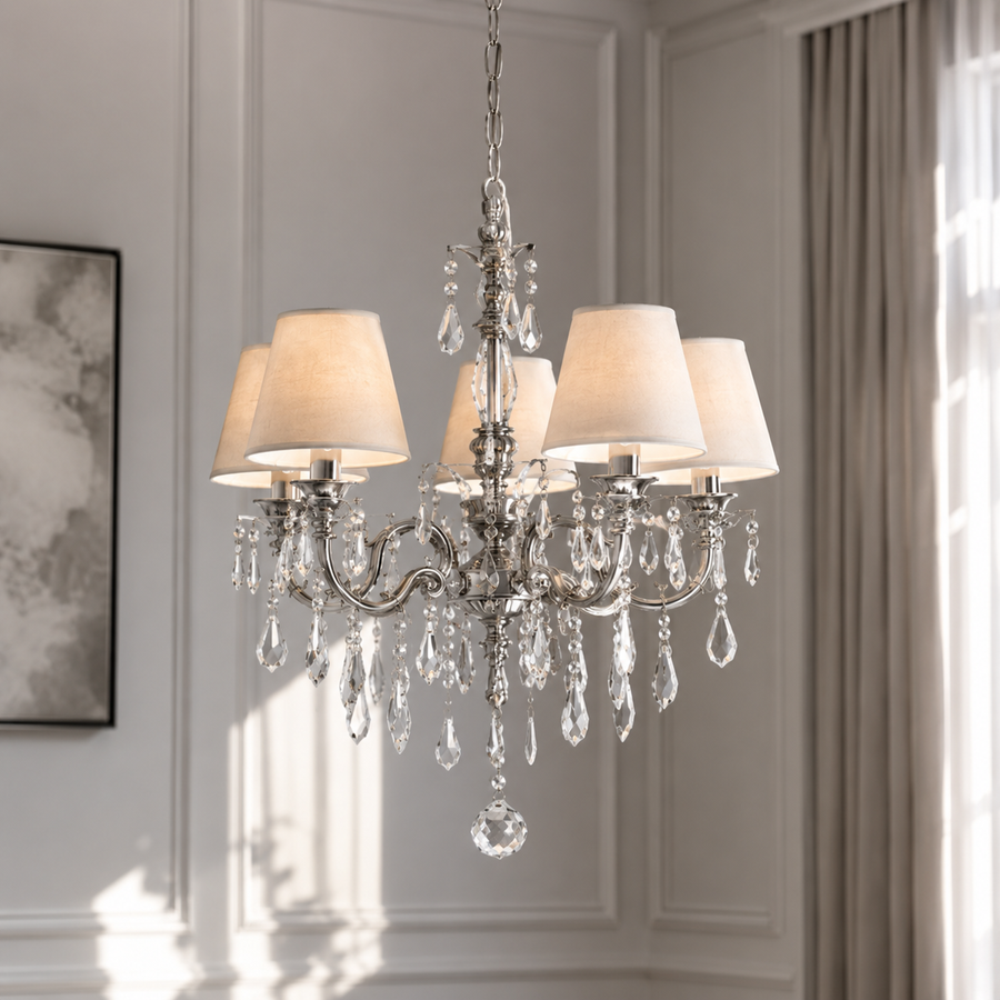 Hanglamp Gus 1088O by Marcottestyle, Antiek Zilver six-arm chandelier styled in a modern luxury living room with velvet carpet and classic framing, realistic sunlight reflections and window lighting, photorealistic lifestyle interior shot