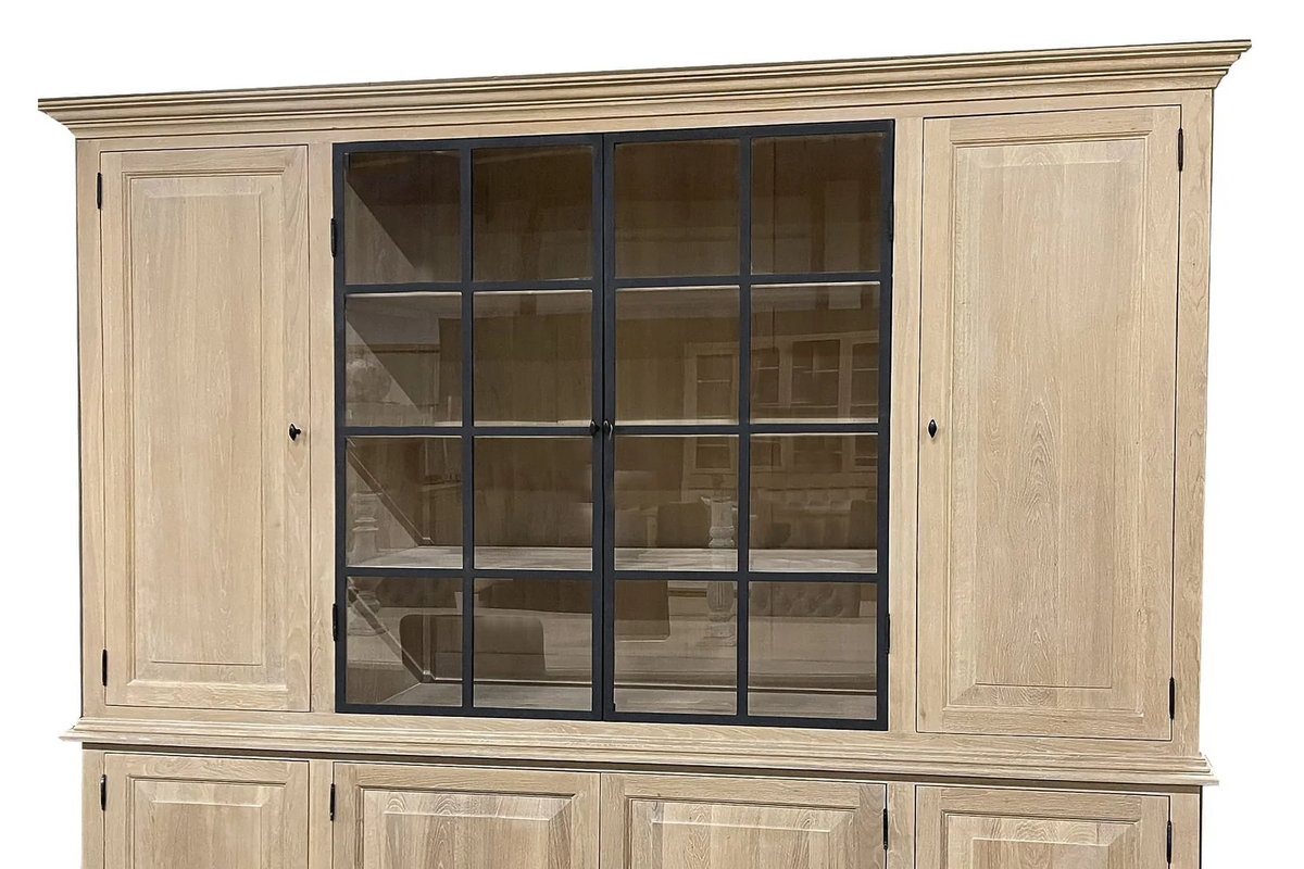 Close-up of the black iron-framed window-pane glass doors on the oak Barton display cabinet