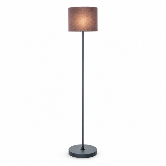 Floor Lamp Karin 6702B illuminated on white background - warm glow softly diffused through the black fabric shade, front view showing the lamp switched on by Marcottestyle