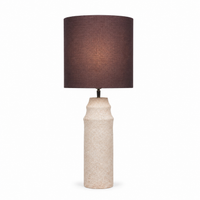 Tafellamp Lukas 9926Z in taupe with warm light gently glowing through the fabric shade, front view on Wit background showing soft illumination effect by Marcottestyle