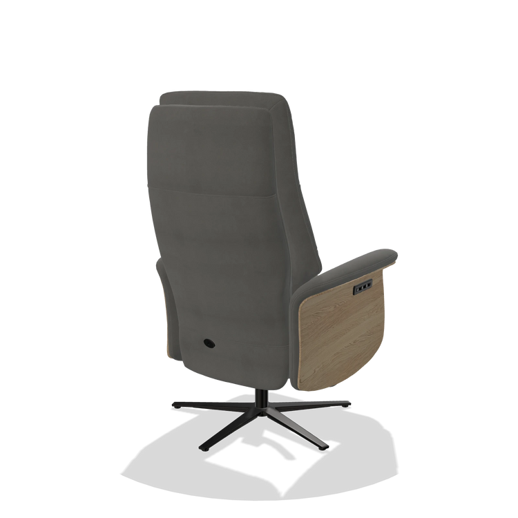 Recliner Atlas 6685 in Leather B400 (dark grey), natural wood side panels, black metal base, back angled view
