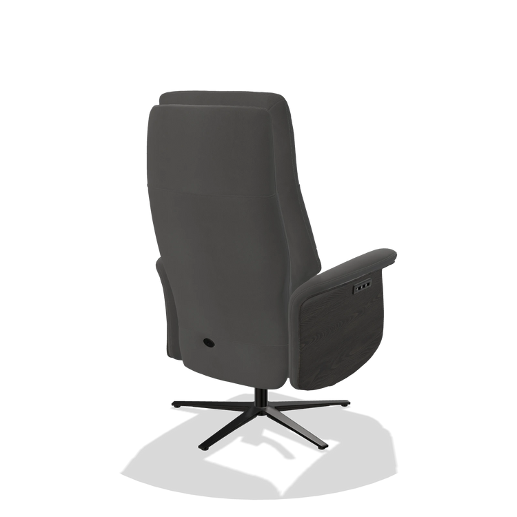 Recliner Atlas 6685 in Leather B502 (dark grey), tobacco wood side panels, black metal base, back angled view