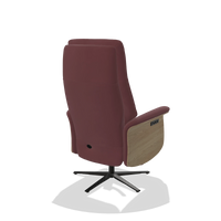 Recliner Atlas 6685 in Leather B554 (brown), natural wood side panels, black metal base, back angled view