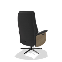 Recliner Atlas 6685 in Leather B900 (black), natural wood side panels, black metal base, back angled view