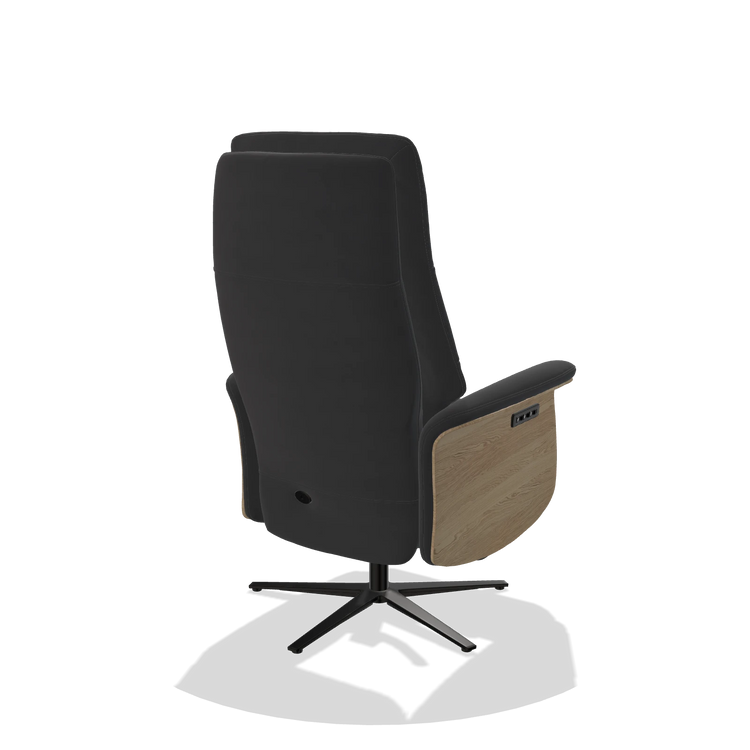 Recliner Atlas 6685 in Leather B900 (black), natural wood side panels, black metal base, back angled view