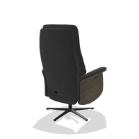 Recliner Atlas 6685 in Leather B900 (black), walnut wood side panels, black metal base, back angled view
