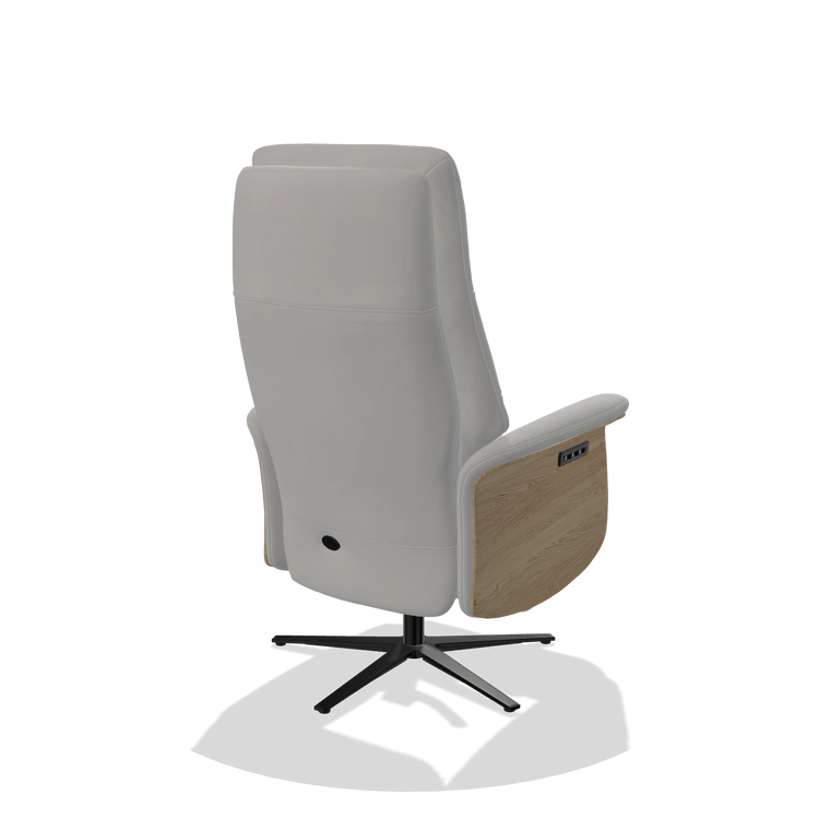 Recliner Atlas 6685 in Leather B904 (light grey), natural wood side panels, black metal base, back angled view