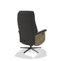 Recliner Atlas 6685 in Leather B905 (anthracite), natural wood side panels, black metal base, back angled view