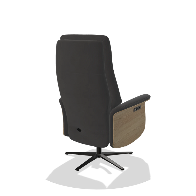 Recliner Atlas 6685 in Leather B905 (anthracite), natural wood side panels, black metal base, back angled view