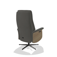 Recliner Atlas 6685 in Leather B945 (dark grey), natural wood side panels, black metal base, back angled view