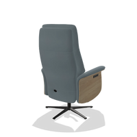 Recliner Atlas 6685 in Leather B963 (grey), natural wood side panels, black metal base, back angled view
