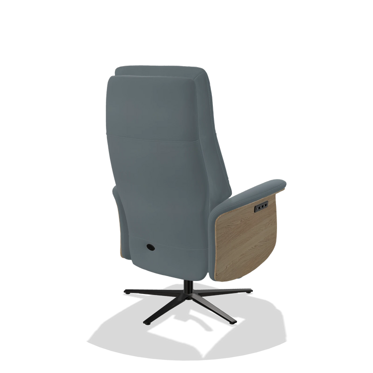 Recliner Atlas 6685 in Leather B963 (grey), natural wood side panels, black metal base, back angled view