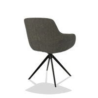 Chaise de salle à manger avec accoudoirs Ferrara 6406 en tissu Adore 156 (gris foncé), pied pivotant en noir, vue de trois-quarts arrière