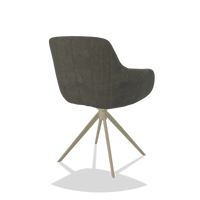 Chaise de salle à manger avec accoudoirs Ferrara 6406 en tissu Adore 156 (gris foncé), pied pivotant en champagne, vue de trois-quarts arrière