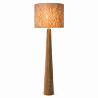 Lampadaire MARINO 9662S avec light turned on  -  warm glow softly visible through the Harlequin Orange fabric shade, natural metal base on white background, studio product photography by Marcottestyle