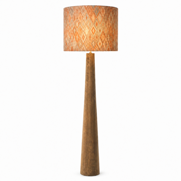 Floor Lamp MARINO 9662S with light turned on — warm glow softly visible through the Harlequin Orange fabric shade, natural metal base on white background, studio product photography by Marcottestyle