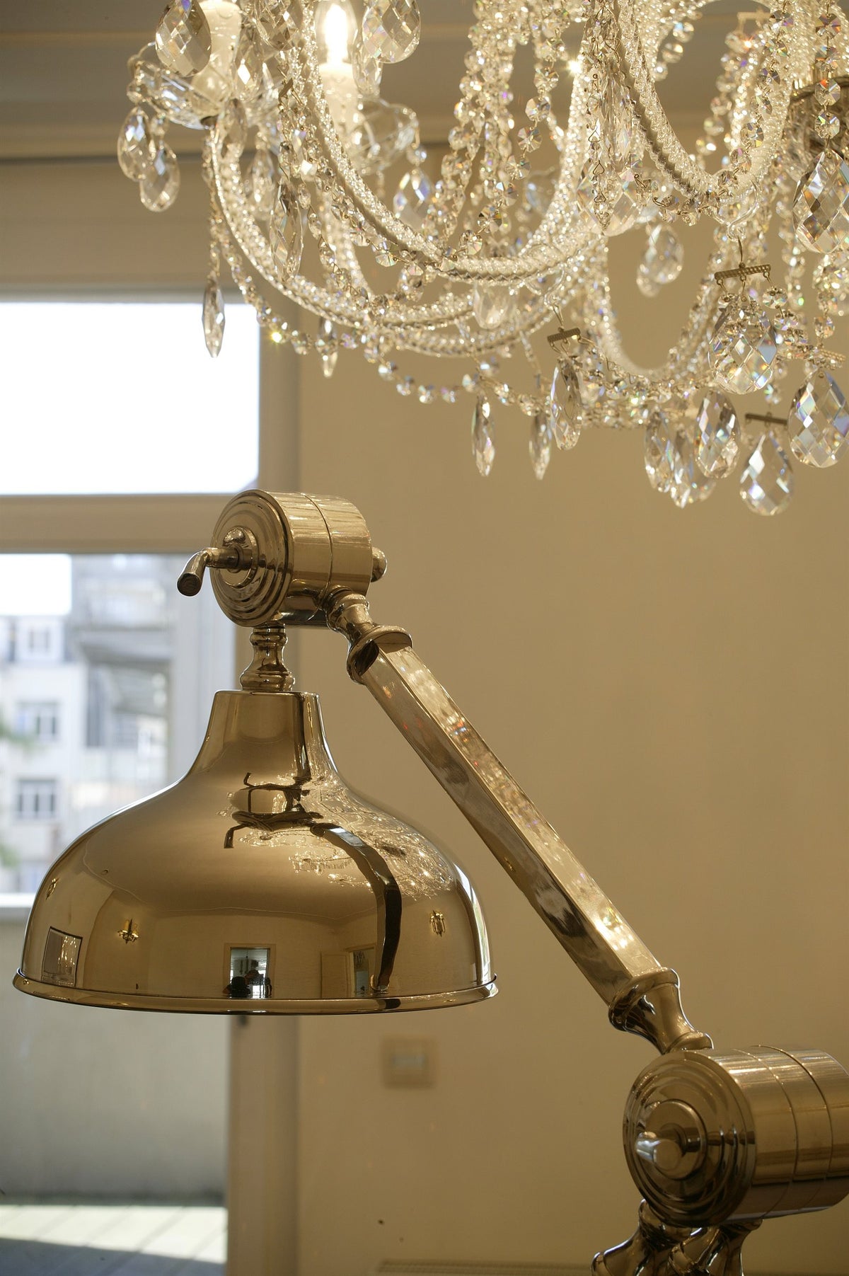 Brass desk lamp under the crystal chandelier - Embassy, Brussels