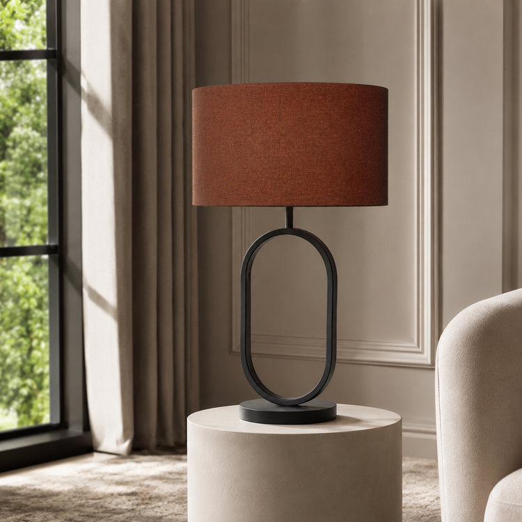 Lámpara de mesa Merit 5087W - Black styled in a modern luxury living room interior with natural sunlight, velvet carpet and classic framing creating a photorealistic lifestyle setting by Marcottestyle | Marcottestyle