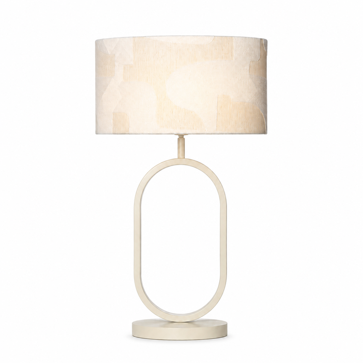 Table Lamp Merit 9026N White with lamp illuminated showing warm light glow through white fabric shade on white background professional product shot by Marcottestyle