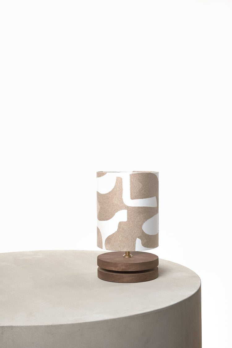 Table Lamp Niels 4349M Natural front view on white background, featuring a metal base with natural finish and cylindrical Harlequin Orange shade, professional studio lighting by Marcottestyle