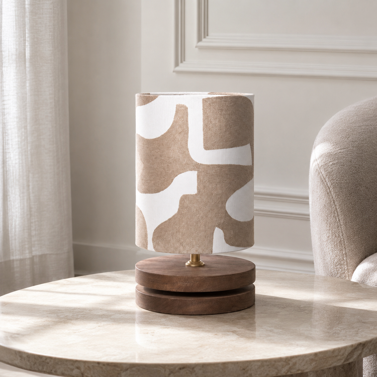 Table Lamp Niels 4349M Natural with light turned on showing warm glow through Harlequin Orange fabric shade, natural metal base on white background by Marcottestyle