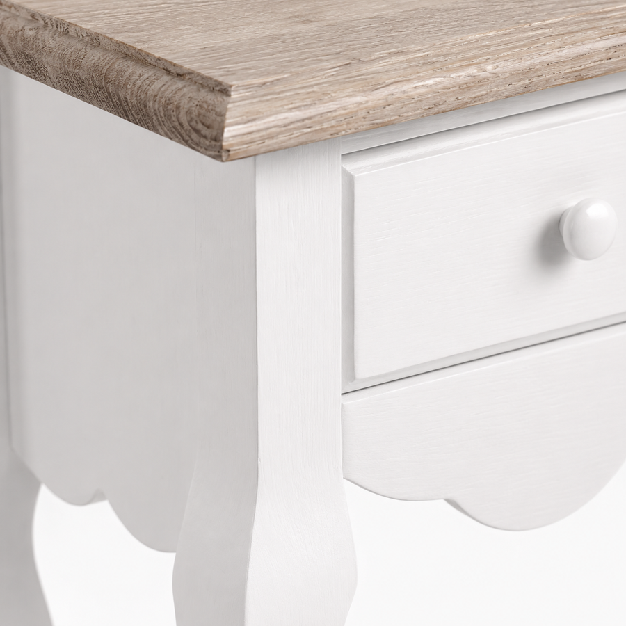 Close-up of the white painted finish and oak top detailing of the Cahors nightstand