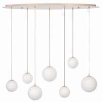Suspension Stella 2174R in beige glass finish, front view showing seven frosted glass globe shades suspended at varying heights from a slim oval ceiling canopy, professional studio photography on white background by Marcottestyle