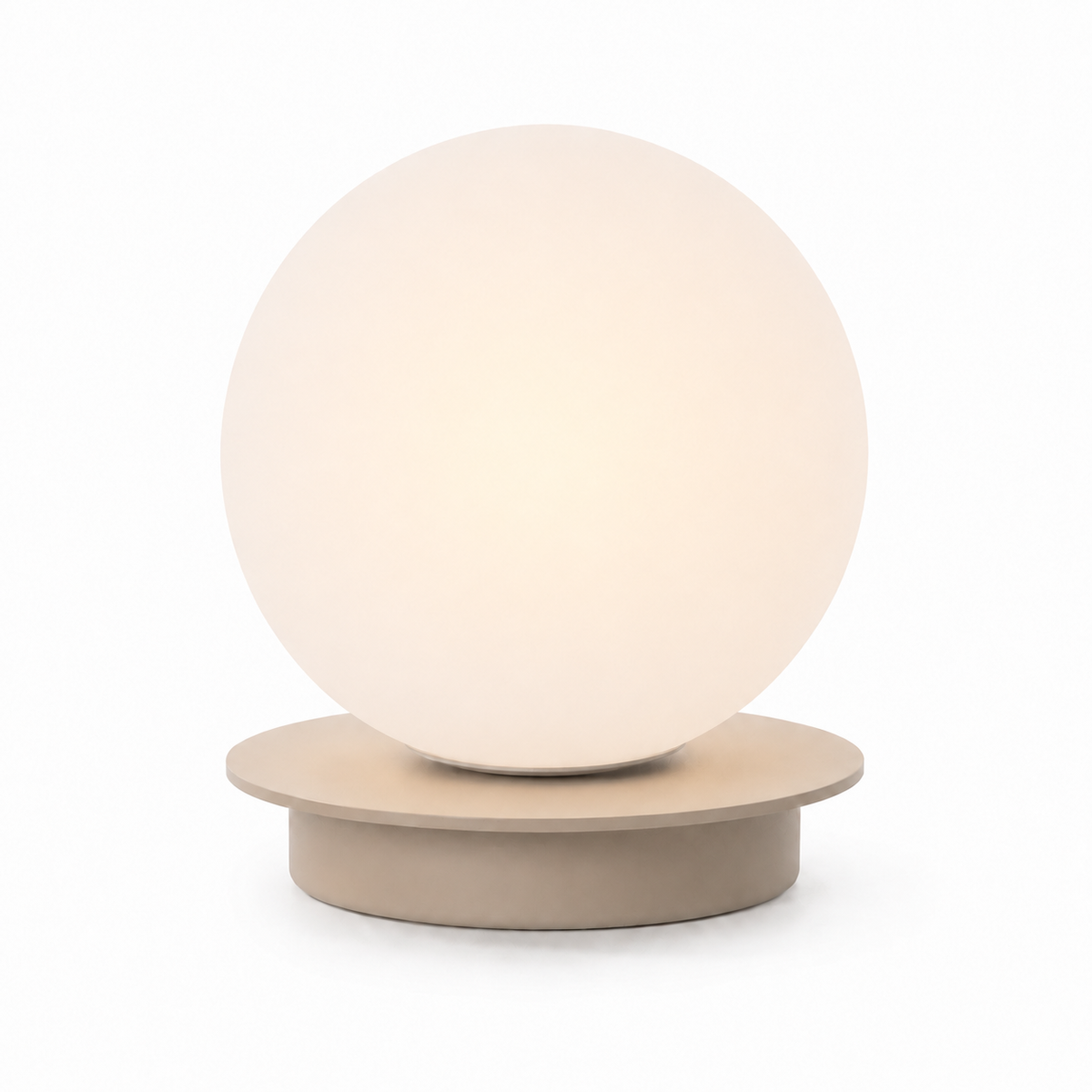 Table Lamp Stella 3154J with light on, soft warm glow visible through frosted white spherical shade on white background by Marcottestyle
