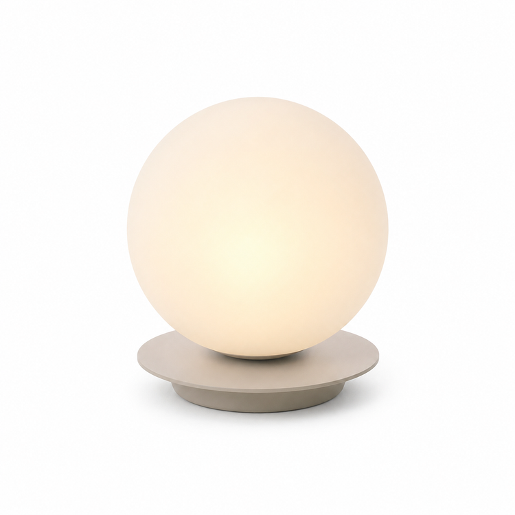 Table Lamp Stella 8417I with light turned on showing warm soft glow through beige fabric shade on pure white background by Marcottestyle