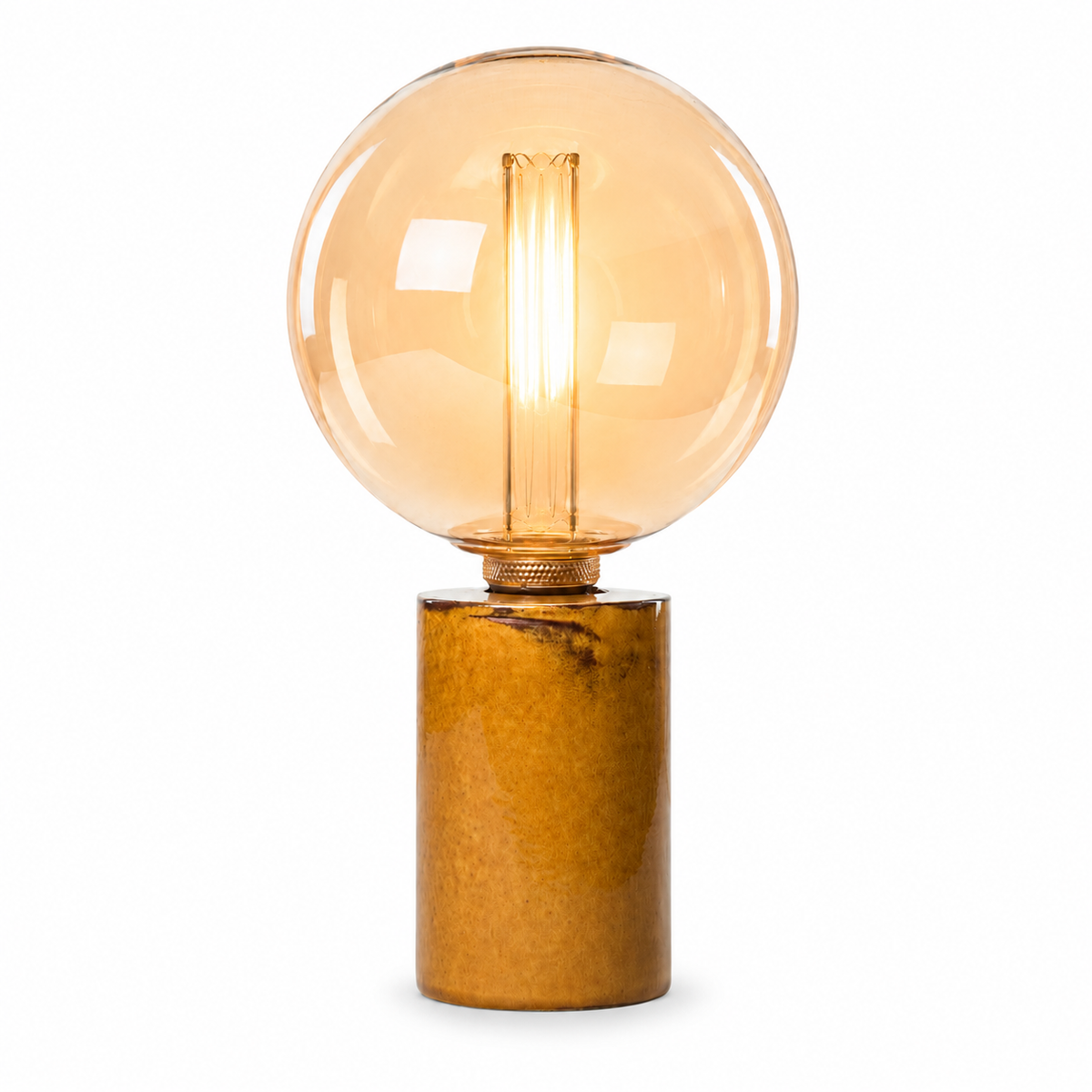 Table Lamp Jutta 2724Y yellow with warm amber glow from globe bulb illuminated, front view on clean white background showing soft light through glass by Marcottestyle