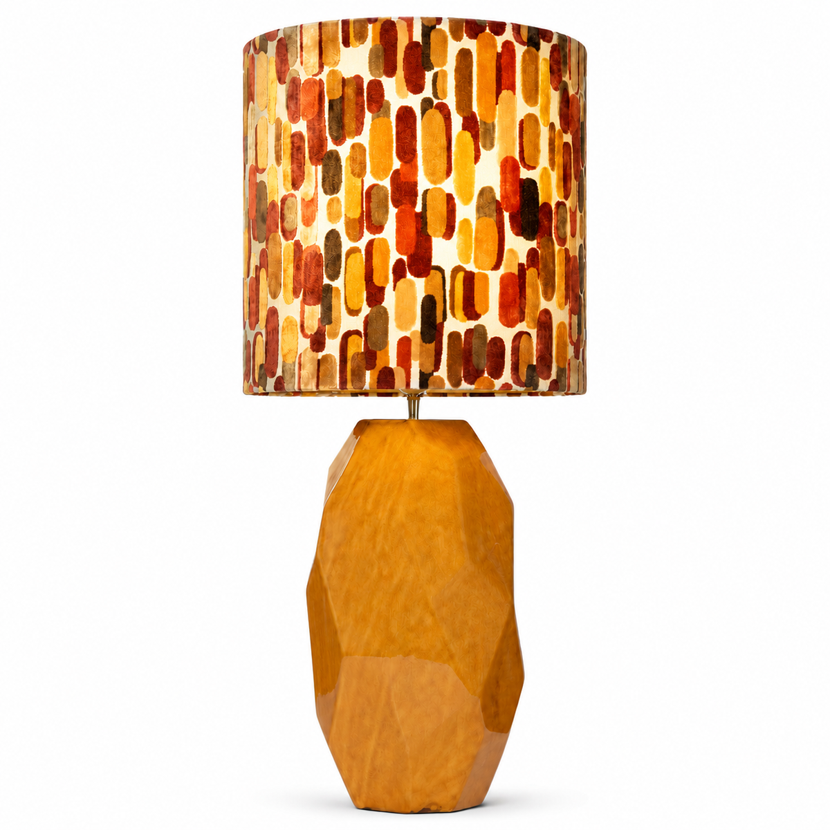 Table Lamp Thor 5563Q in yellow with lights turned on showing warm glow through the mosaic glass shade, front view on white background with professional studio lighting by Marcottestyle