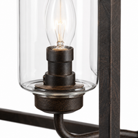 Macro close-up detail of Thora 2891A rust-finished pendant light showing aged textured metal finish, clear glass cylinder shade and Edison-style candle bulb of the 4xE27 square ceiling pendant by Marcottestyle