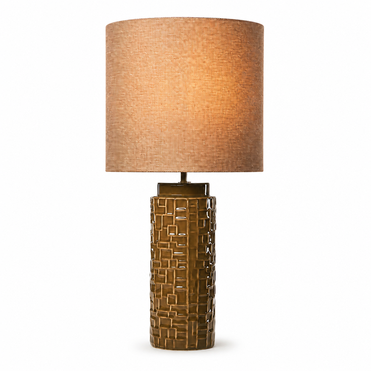 Table Lamp Tilda 3384Q olive ceramic base with shade illuminated showing warm glow through fabric, front view on white background with subtle studio lighting by Marcottestyle