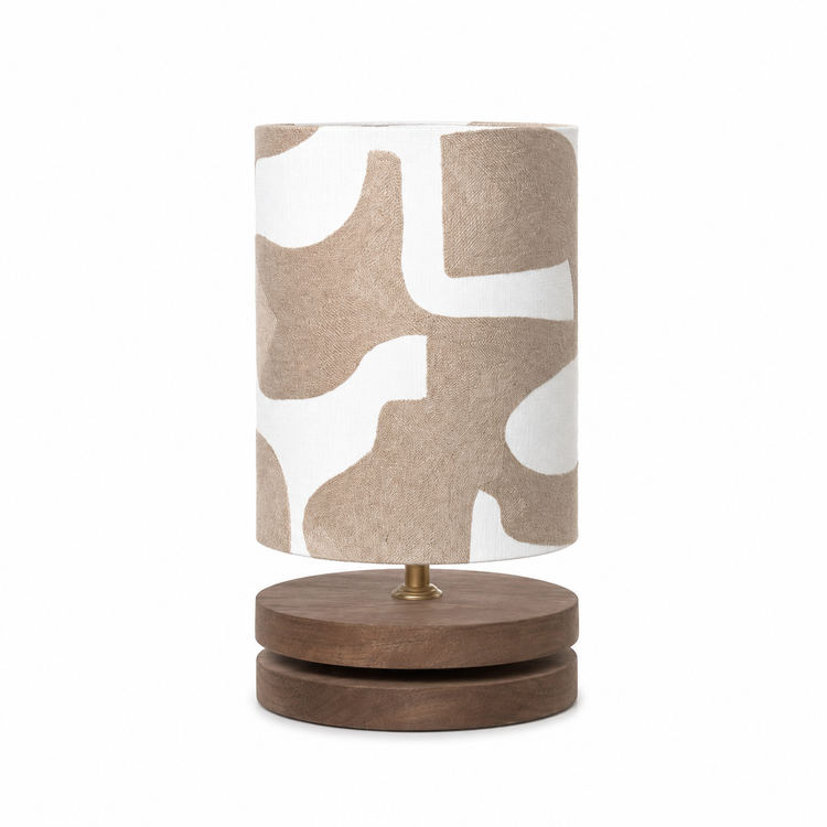 Close-up macro detail of the Floor Lamp Tova 9164X showing the natural linen weave texture of the cylindrical shade and brushed black metal finish by Marcottestyle